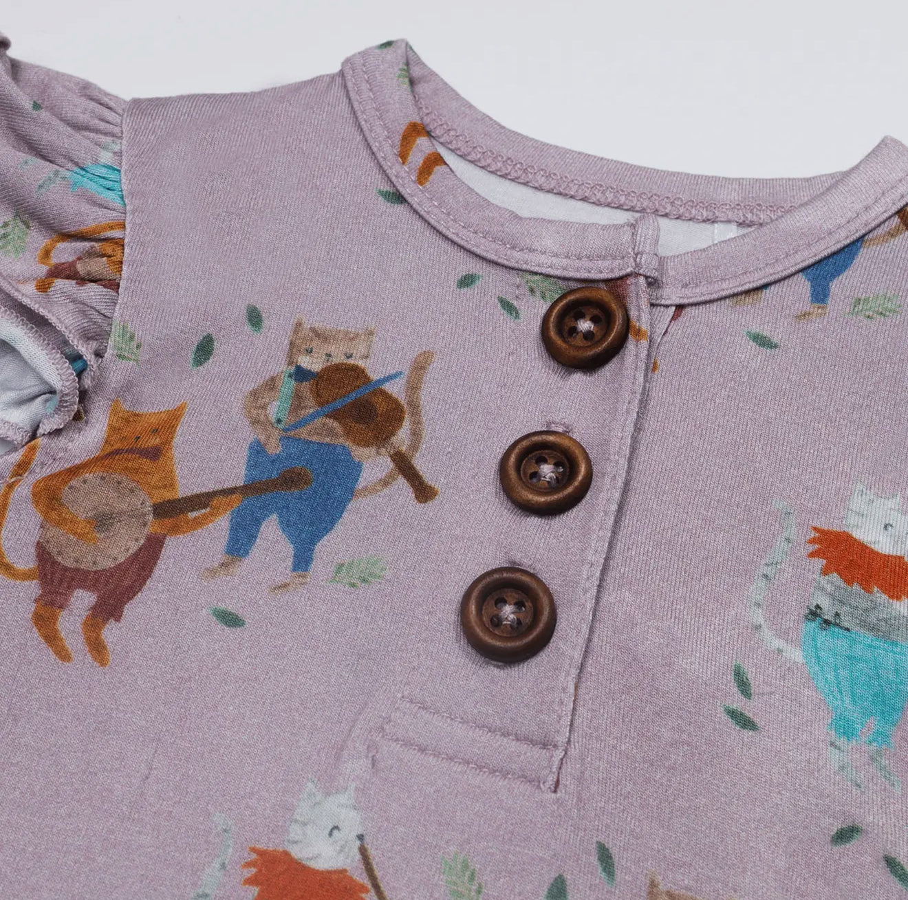 The Petite Giraffe bamboo ruffle onesie