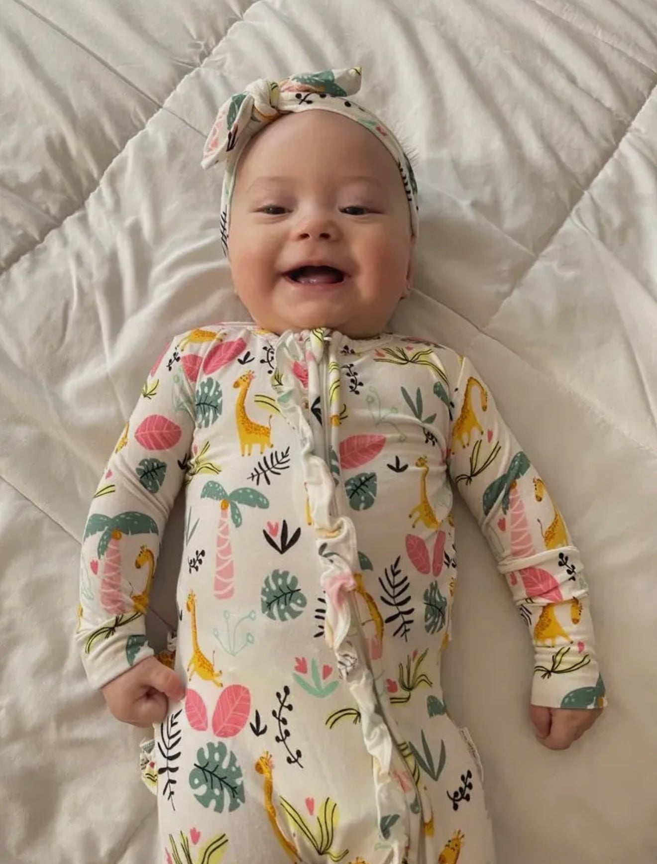 The Petite Giraffe bamboo footie zipper romper with ruffle