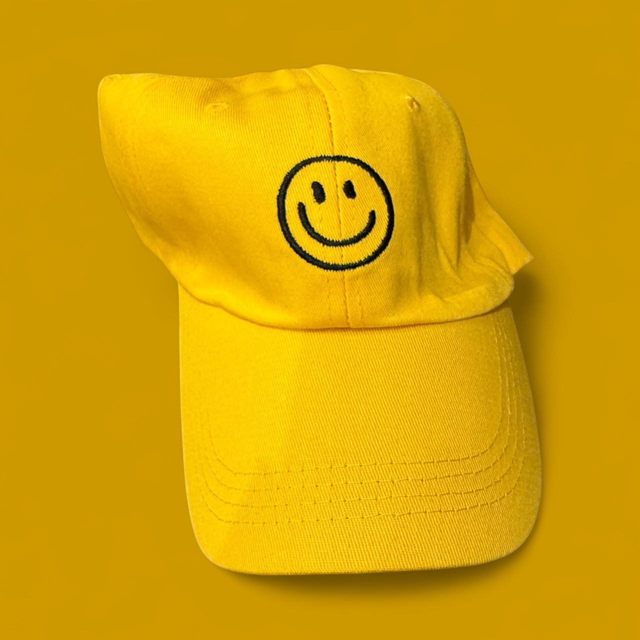 Smiley face embroidered hat