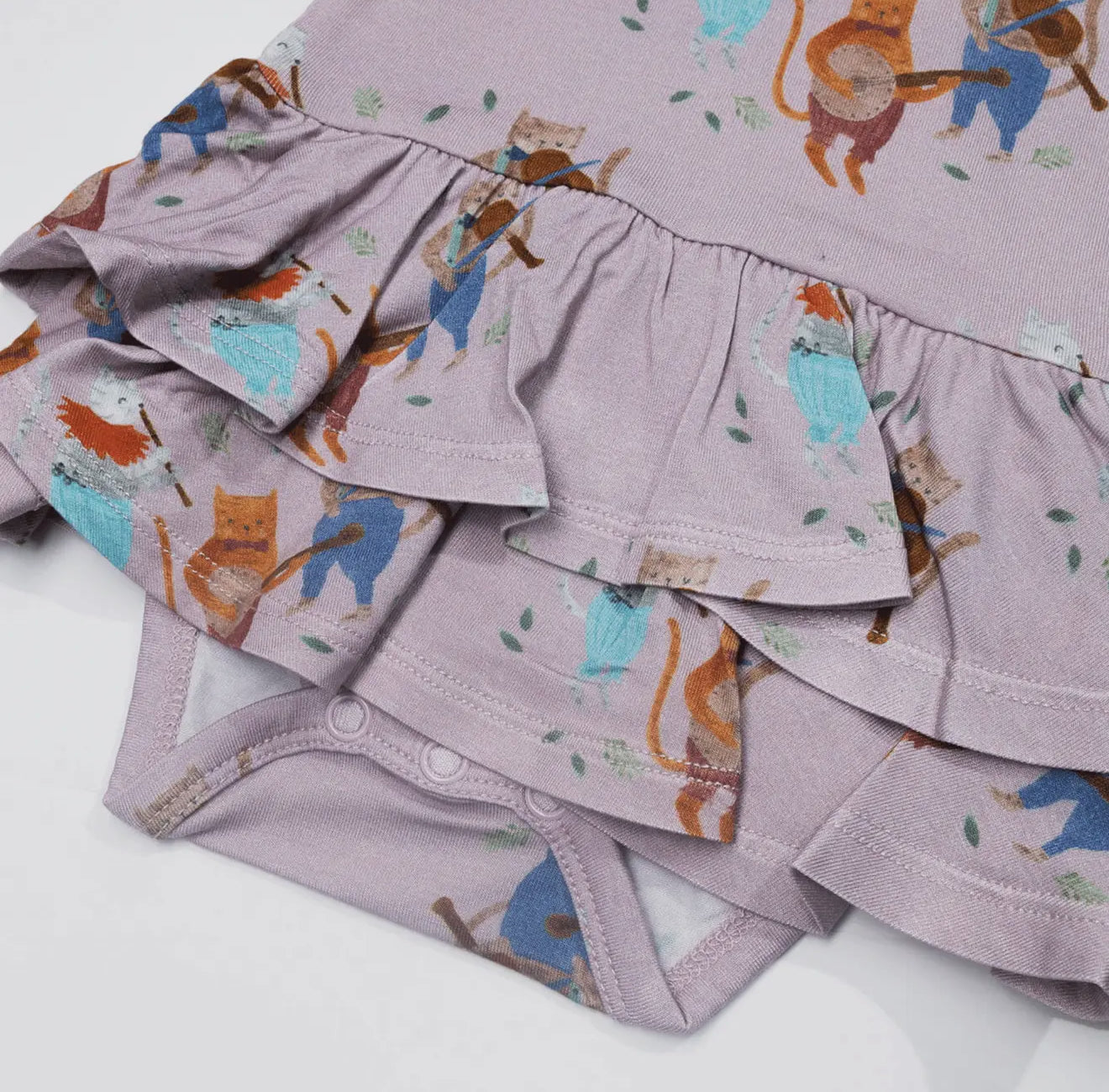 The Petite Giraffe bamboo ruffle onesie