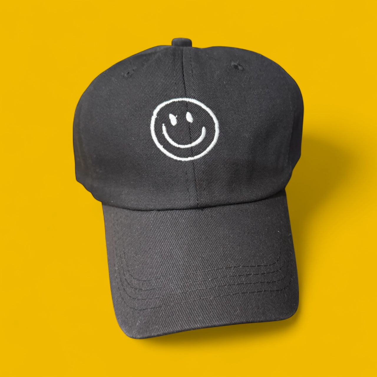 Smiley face embroidered hat